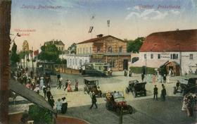 Gasthof Probstheida mit dem Völkerschlachtdenkmal im Hintergrund, Ansichtskarte um 1915